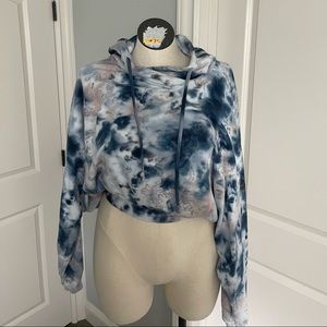 Brand new Never worn hoodie has a snap to synch it in. But loose & cropped